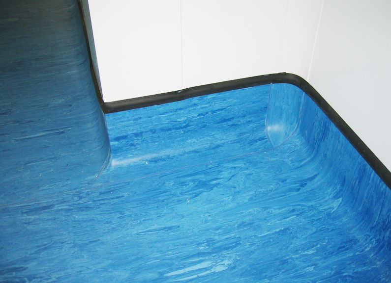 Coved vinyl floor finish